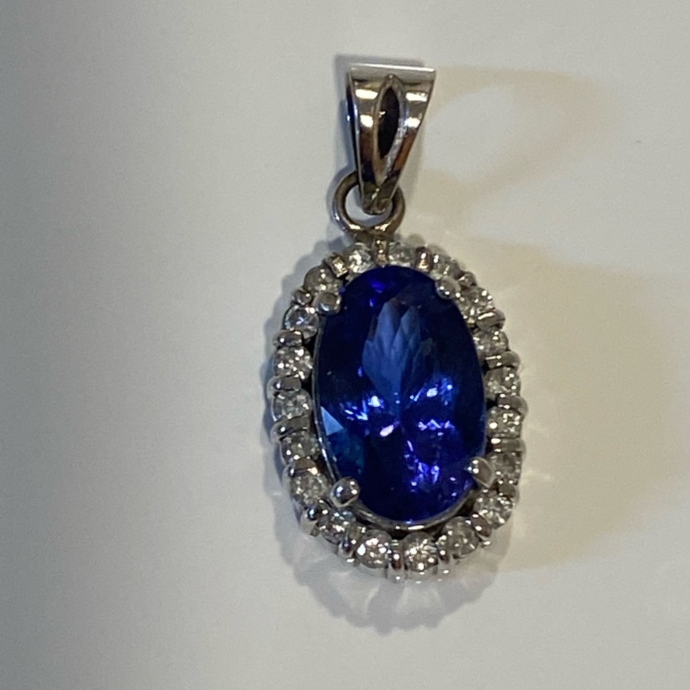 Clear authentic tanzanite with white diamonds